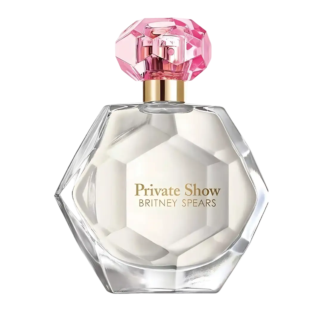 A sparkling pink crystal cap adorns a clear, faceted glass bottle of britney spears’ private show perfume.